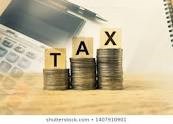 M B TAX