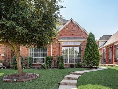 Gorgeous Two Story Duplex With Established Landscaping And Tons Of Curb Appeal